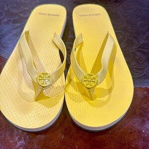 Tory Burch flip flops nwot new stickers on bottom